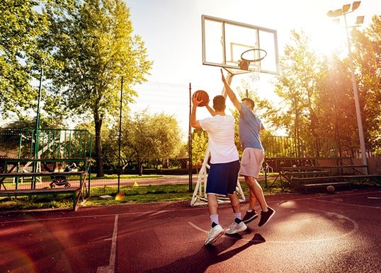 Engage in a game of basketball at the court in Central Park Flower Valley, Clover Floors Engage in a game of basketball at the court in Central Park Flower Valley, Clover Floors